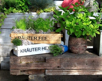 Skrzynka na kwiaty Skrzynka na rośliny z drewna płomienistego z drewnianymi uchwytami i nadrukiem o szerokości 50 - 90 cm i głębokości 15 cm