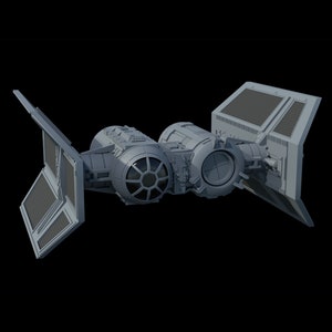 Puede incluir: Una nave espacial TIE fighter gris con dos alas y una cabina. La nave espacial tiene un diseño detallado con respiraderos de motor y paneles visibles.