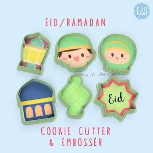 May include: Set of six green plastic cookie cutters and embossers featuring Ramadan and Eid themes. The cutters include a mosque, lantern, crescent moon, star, and two cartoon faces.