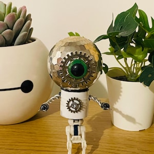 Computer Geek Robot sculpture - A perfect gift for nerds and sci-fi lovers alike made from recycled tech parts! Robot: Disco