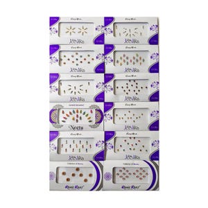Puede incluir: Una colección de pegatinas decorativas bindi en varios diseños y colores, presentadas en cajas individuales. Las cajas presentan las marcas "Jeevika", "Neetu" y "Ranie Raaj", con textos como "Fancy Work" y "Collection of Beauty".