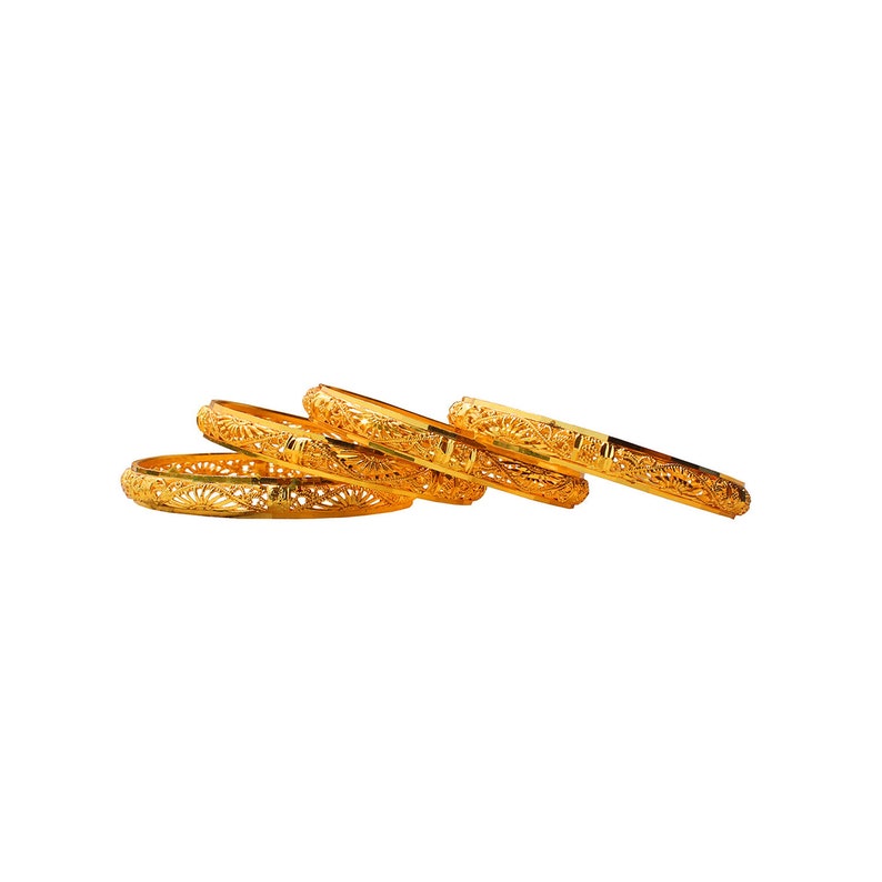 May include: Five gold bangles with intricate floral patterns are displayed against a white background. The bangles are stacked and angled, showcasing their detailed design and shiny finish. The jewelry is likely for fashion or special occasions.