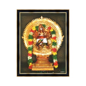 May include: A framed image of a golden deity with multiple arms, seated on a throne with a circular halo. The deity is adorned with garlands of flowers and is surrounded by intricate details.