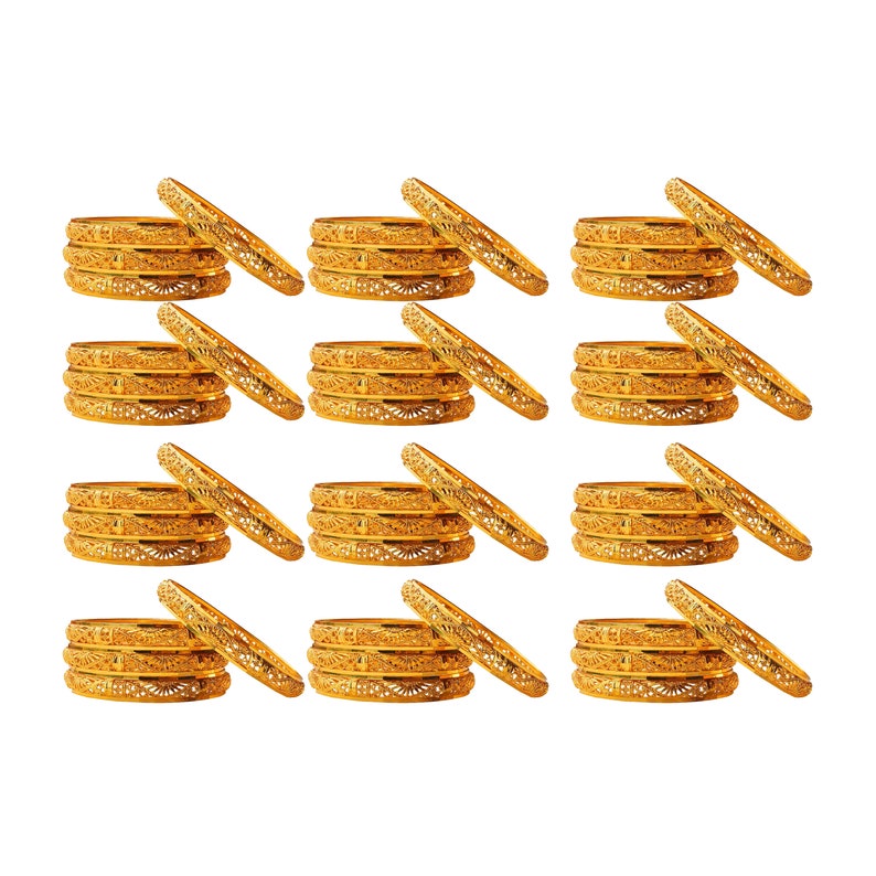 May include: Multiple stacks of gold-colored bangles are displayed against a white background. Each stack consists of several intricately designed bangles, with a matching single bangle resting beside each stack. The bangles have detailed patterns.