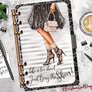 May include: A planner page with a fashion illustration of a woman in high heels, holding a purse. The text "life is too short... Just Buy the Shoes!" is displayed. A notepad with "$350? New Shoes OR??" is also visible.