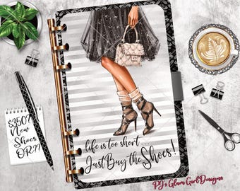 May include: A planner page with a fashion illustration of a woman in high heels, holding a purse. The text "life is too short... Just Buy the Shoes!" is displayed. A notepad with "$350? New Shoes OR??" is also visible.