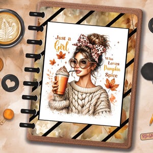 May include: A planner with a watercolor illustration of a woman with sunglasses, holding a pumpkin spice drink. The text reads "Just a Girl Who Loves Pumpkin Spice." Includes decorative heart-shaped discs, a coffee cup, and pens.