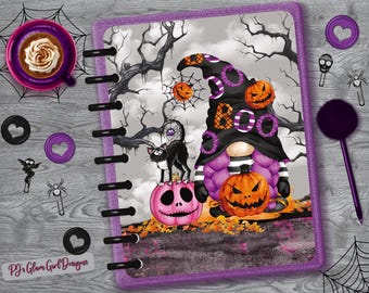 May include: A Halloween-themed planner with a purple border, featuring a gnome, pumpkins, and a black cat. The word "BOO" is on the gnome's hat. Includes a purple coffee cup, decorative clips, and a pen. The text "PJ's Glam Girl Designs" is at the bottom.
