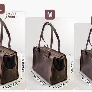 May include: Three brown leather pet carrier bags in different sizes: large, medium, and small. The bags have a top handle and a zippered opening. The bags are labelled with their size and measurements in inches and centimetres.