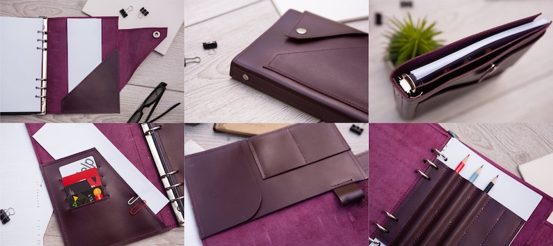 May include: A burgundy leather bound journal with a pocket on the front cover. The journal has a ring binder system and a flap that closes with a button. The journal is open to reveal a blank page and a pocket on the inside cover.