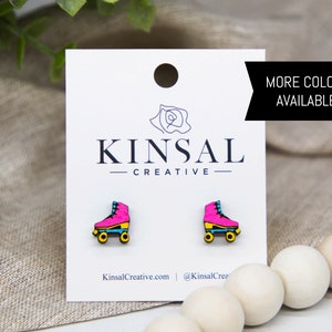 Może przedstawiać: Para różowych, niebieskich i żółtych rolek na uszy na białej kartce z tekstem "Kinsal Creative" i "KinsalCreative.com @KinsalCrea". Na kartce widnieje również napis "Dostępne są inne kolory!"