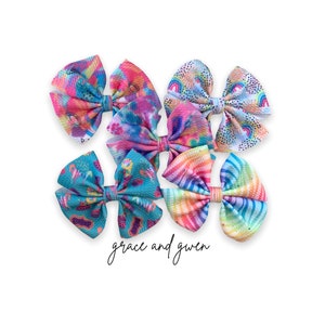 Rainbow Circus Summer Liverpool Pinwheel Bow | Hair Bows for Girls | Baby Bows and Headbands | Nylon Headband Bow | Pigtail Bows | Bow Clips