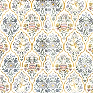 May include: A decorative paper napkin featuring a repeating pattern of white rabbits, colorful Easter eggs, and floral arrangements enclosed within gold-colored scalloped frames against a white background, creating a festive seasonal design.