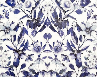 May include: A square paper napkin featuring a symmetrical botanical pattern with deep blue and indigo floral illustrations set against a crisp white background. The design displays various flowers, leaves, and stems arranged in a mirrored layout.