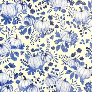 May include: A repeating pattern on a cream background featuring blue pumpkins, small mushrooms, and various botanical elements like leaves and flowers. The design is rendered in a monochromatic blue ink style, showcasing multiple pumpkin sizes.