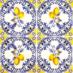 May include: A set of four square paper napkins featuring a repeating pattern of bright yellow lemons with green leaves and small yellow flowers, framed by intricate dark blue and light blue scrollwork designs on a white background.