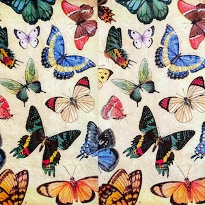 May include: A repeating pattern of colorful butterflies in various sizes and designs. The butterflies feature shades of blue, red, yellow, green, and purple, set against a cream-colored background. The image has a vintage, artistic aesthetic.
