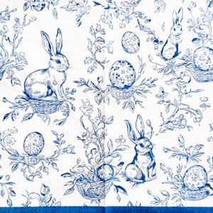 May include: A white and blue Easter-themed pattern featuring rabbits, eggs, and floral motifs. The design is reminiscent of classic toile patterns, with detailed illustrations of bunnies in baskets and decorated eggs.
