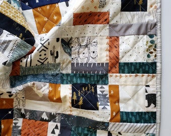 The Evergreen Scrap Baby Quilt