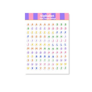 Op de afbeelding: Alfabetstickervel met kleurrijke letterstickers. Het vel heeft een roze en paarse gestreepte kop met de woorden "Alphabet" en "Only happy things". Elke letter heeft een andere kleur.