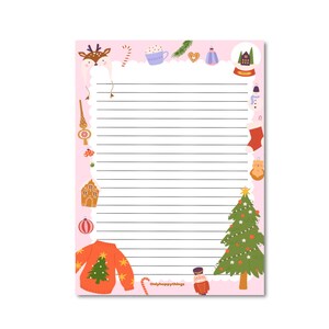Op de afbeelding: Een roze notitieblok met kerstthema met gelinieerd papier. De rand bevat feestelijke illustraties zoals een rendier, ornamenten, een peperkoekhuisje en een kerstboom. Het notitieblok bevat de tekst "Onlyhappythings".