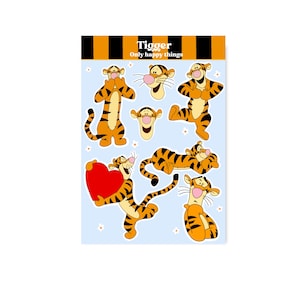 May include: A sticker sheet featuring Tigger in various poses on a light blue background with small white flowers. The top header has black and orange stripes with the text Tigger Only happy things. The orange tiger has black stripes.