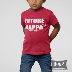 May include: A red short-sleeved t-shirt with white text that reads "Future Kappa "I Got Next".