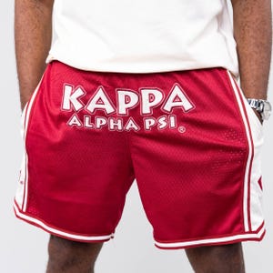 Pantaloncini Kappa Alpha Psi ricamati color cremisi con strisce color crema