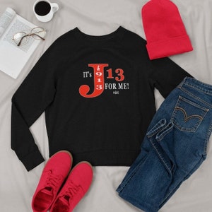 May include: Black sweatshirt with a red graphic of the letter J with the numbers 913 and the text "It's J13 for me! #dst".