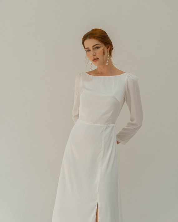Cream formal top dress with sleeves