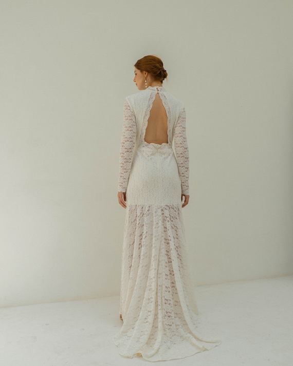 Aurora Long Sleeve Lace Wedding Dress: Open Back, Floor Length Train Aurora Long Sleeve Lace Wedding Dress: Open Back, Floor Length Train
