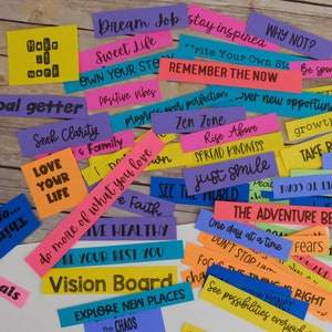 Peut inclure: Une collection de bandes de papier color&eacute;es avec des phrases de motivation et d'inspiration &eacute;crites dessus. Les phrases incluent "Dream Job", "Sweet Life", "Own Your Story", "Write Your Own Story", "Remember The Now", "Positive Vibes", "Zen Zone", "Rise Above", "Spread Kindness", "Just Smile", "See The World", "The Adventure Begins", "One Day At A Time", "Don't Stop", "Focus", "The Timing Is Right", "See Possibilities Everywhere", "Unmask", "Live Your Life", "Be True", "Take Risks", "Goal Getter", "Seek Clarity", "Love Your Life", "Do More Of What You Love", "Live Healthy", "Be Your Best You", "Vision Board", "Explore New Places", "The Chaos", "Help Get", "Be Spontaneous", "Growth Minds", "Trust", "Get", "Setback", "New".