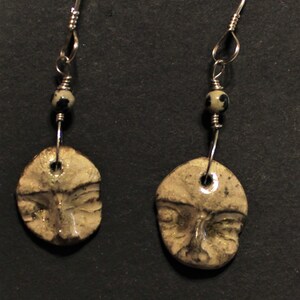 Hand formed polymer clay face earrings accented with small Dalmatian jasper beads beads
