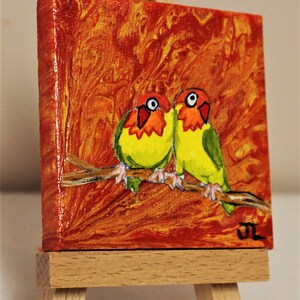 mini 3x3 canvas painting. Two Parrots Acrylic Painting over an original acrylic Pour painting with easel