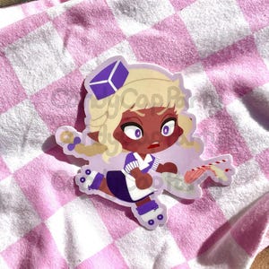 May include: A purple and white cartoon character wearing roller skates and a purple hat, holding a plate with a pink and white dessert and a straw. The character has brown skin and purple eyes. The background is a pink and white checkered pattern.