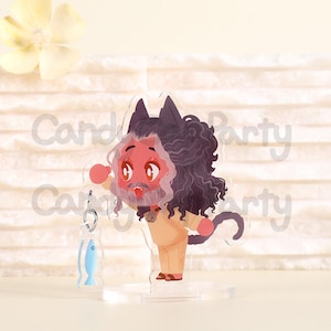 May include: A cartoon character with a long, curly, dark purple beard and hair, wearing a light brown shirt and trousers, with cat ears and a tail. The character is holding a blue fish on a chain.
