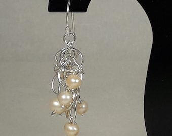 Sterling Silver (925) Earrings with Cultured Pearls.