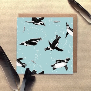 Carte de voeux illustrée de pingouins nageurs