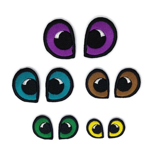 Embroidered doll eyes patch.