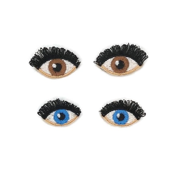 Embroidered doll eyes patch.
