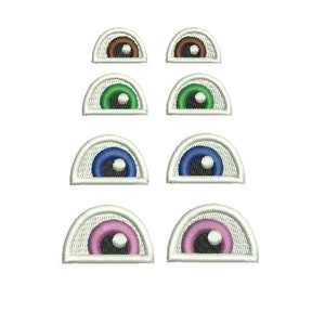 Embroidered doll eyes patch.