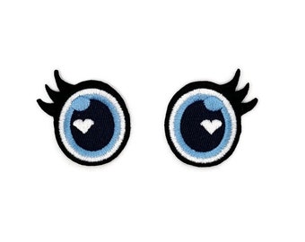Embroidered doll eyes patch.