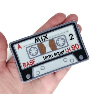 Embroidered retro cassette patch.