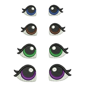 Ojos de muñeca bordados.