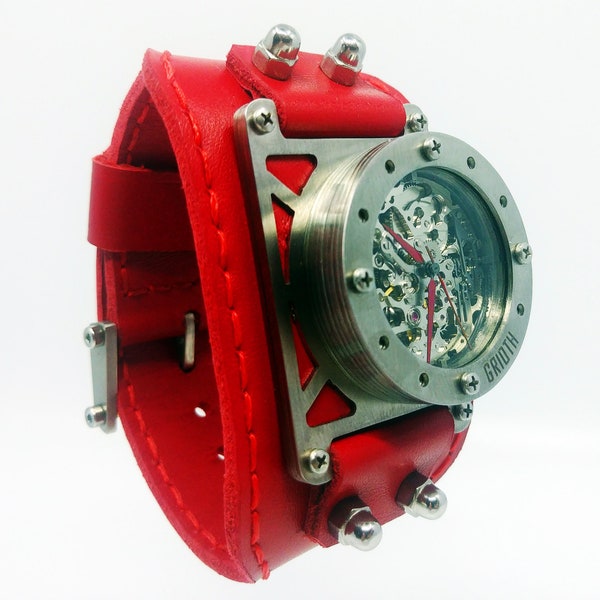 Industrieel mechanisch automatisch horloge. Brede leren rode manchet. Uniek cadeau voor man, vrouw. Alternatief skelethorloge in streetstyle