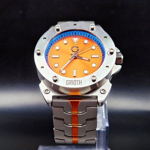 Reloj inusual de estilo industrial para hombre. Diámetro de caja de 41 mm. Movimiento automático Seiko. Brazalete de acero inoxidable. CARRERA-41. esfera naranja imagen 3