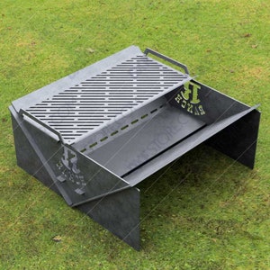 May include: A grey metal folding grill with a grill grate and a wind shield. The grill has a logo that says "BBQ" on it.