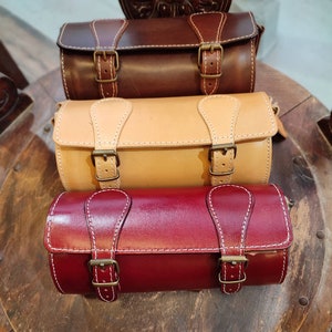 Handmade full grain round leather barrel bag. Cross body strappy leather bag made in Greece. Burgundy red leather bag. gift for him her