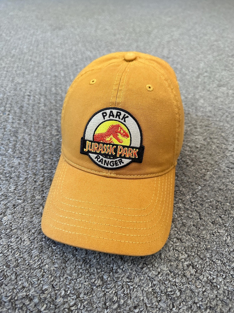 Gorra de malla estilo camionero con cierre a presión de Jurassic Park Ranger Park Security, fabricada a mano individualmente en Florida. Dad Cap Yellow