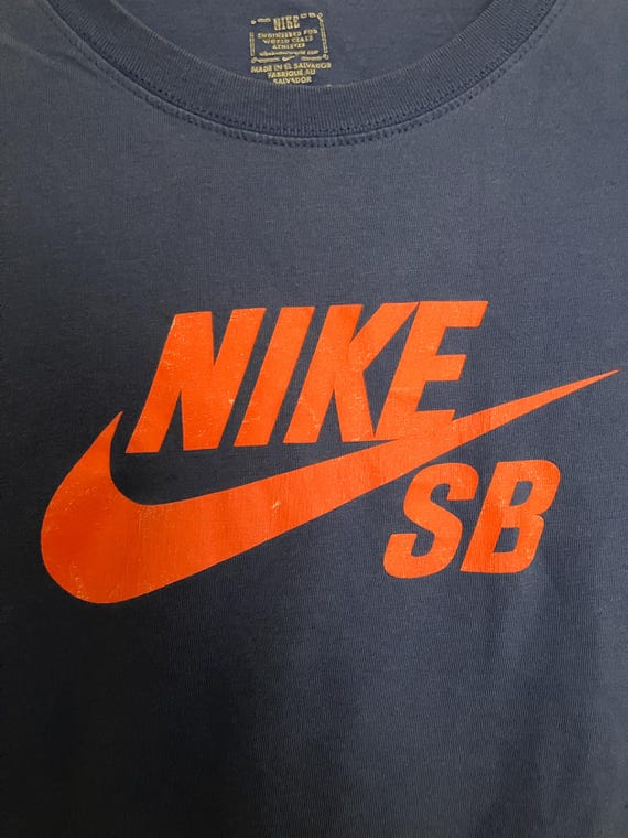 Navy blue and orange nike shirt hot sale